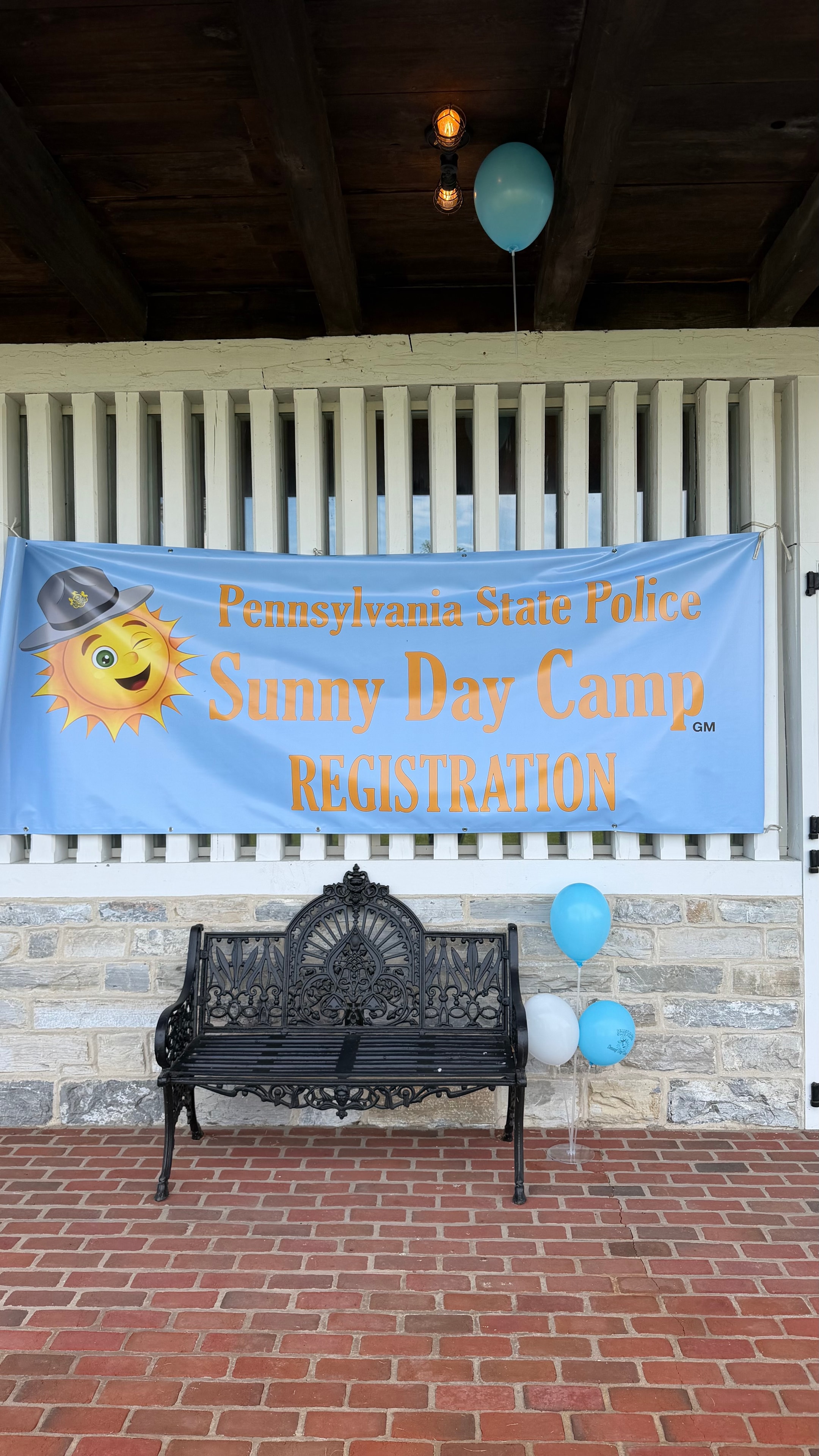 Pennsylvania State Police Sunny Day Camp registration event with balloons